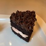 Heart shaped chocolate cakes with strawberry buttercream and chocolate ganache recipe by home cooking with julie neville