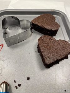 Heart shaped chocolate cakes with strawberry buttercream and chocolate ganache recipe by home cooking with julie neville