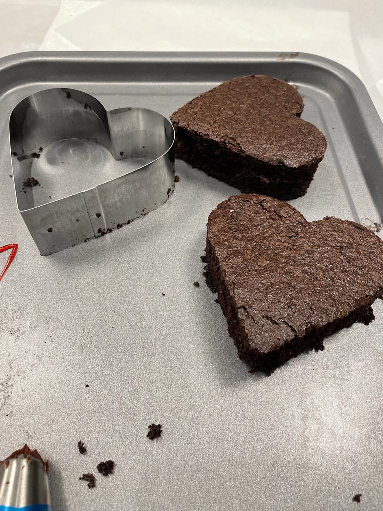 Heart shaped chocolate cakes with strawberry buttercream and chocolate ganache recipe by home cooking with julie neville