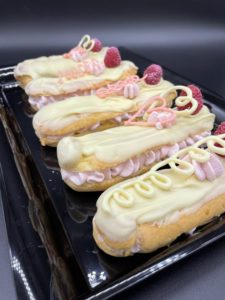 Raspberry white chocolate eclairs recipe by home cooking with julie neville0