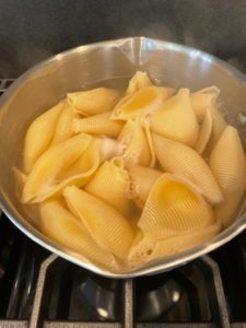 Serve onto plates, spooning over the marinara sauce then sprinkle with the copped parsley.