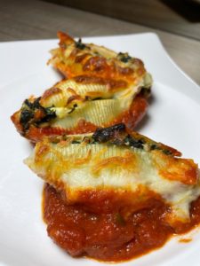 Serve onto plates, spooning over the marinara sauce then sprinkle with the copped parsley.