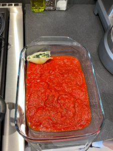 Serve onto plates, spooning over the marinara sauce then sprinkle with the copped parsley.