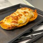 Baked Butternut Squash Topped with Chicken Alfredo