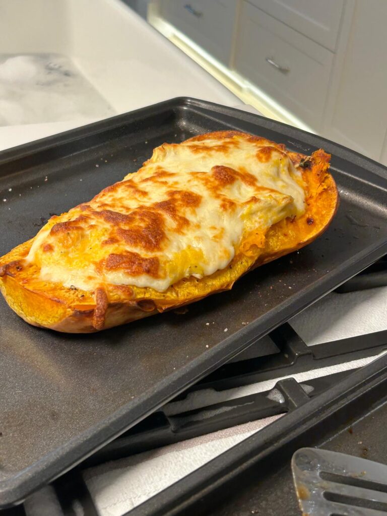 Baked Butternut Squash Topped with Chicken Alfredo