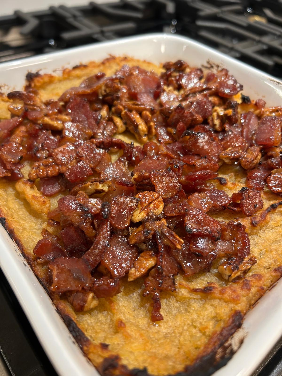 Sweet potato casserole with candied bourbon bacon and pecans