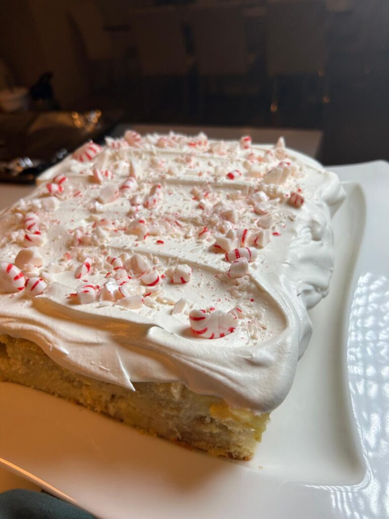 White chocolate peppermint poke cake